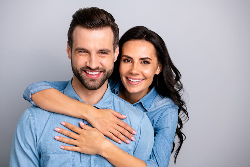 handsome-couple-hugging-and-smiling
